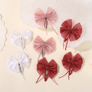 Coffret de barrettes à nœuds en résille pour enfants avec sept pinces à cheveux princesse