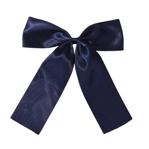 Elegant navy blue satin bow hair clip with long ribbons for girls on a white background