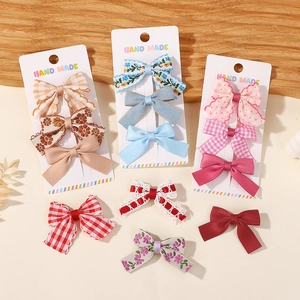 Lot de barrettes à nœuds faits main pour enfants avec motifs floraux et carreaux sur carte