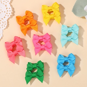 Detailed set of 14 colorful grosgrain ribbon hair bows for girls in multiple bright shades