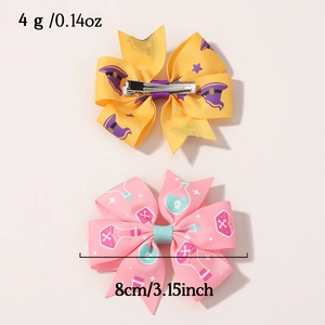 Detail showing 8cm Halloween hair bows with wizard hats and skull potion patterns