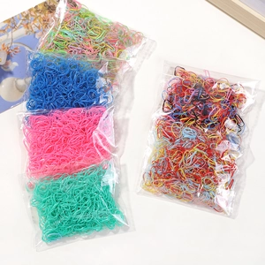 Colorful high-elastic disposable hair bands set in transparent bags on white background