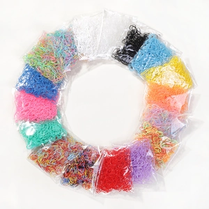 Macro view of colorful high-elastic disposable hair bands set in multi-color packaging