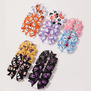 Set of 6 Halloween themed grosgrain ribbon bow clips with ghost and pumpkin patterns