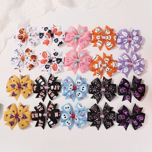 Set of 20 Halloween ribbon hair bows with pumpkin and ghost motifs for girls' party wear