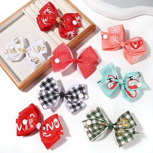 7-piece Christmas grosgrain ribbon hair bow set featuring reindeer and snowflake patterns