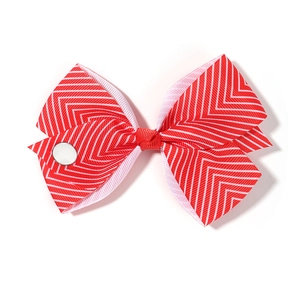 Christmas themed red and white striped ribbon hair bow with center snap button