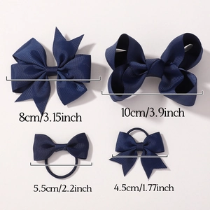9-piece navy blue bow hair clip set for girls including various sizes of ribbon bows