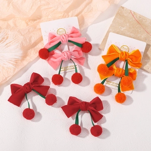 Barrettes à nœuds en velours de Noël avec pompons cerises en rose orange et rouge