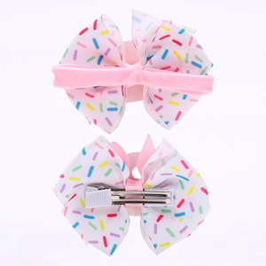 Ensemble bandeau élastique rose et barrette à nœud avec motifs rayés colorés