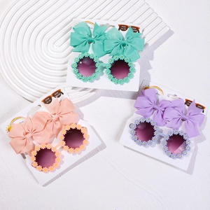 Ensemble détaillé de lunettes de soleil enfants avec fleurs de marguerite et nœuds