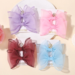 Lot de quatre barrettes à cheveux en forme de nœud en organza pour filles en couleurs pastel