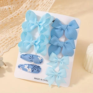 8-piece set of blue waffle textured and floral bows hair clips for baby girls