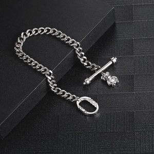 Silver Cuban chain bracelet with crystal-encrusted bear charm and OT clasp closure