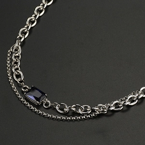 Double-layered titanium steel necklace featuring a rectangular blue sapphire pendant