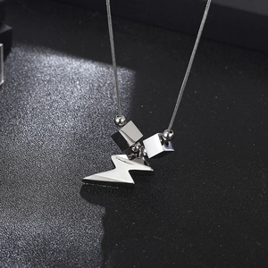 Industrial silver lightning pendant necklace with square beads on a sleek snake chain