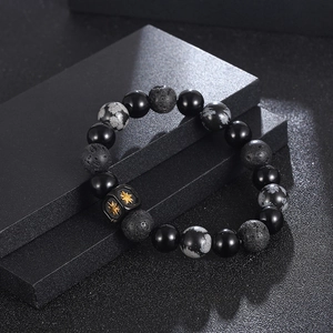 Beaded bracelet with black onyx, volcanic stone, and golden star square metal charm