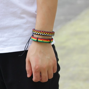 Handmade woven leather bracelet set with colorful patterns and adjustable star design