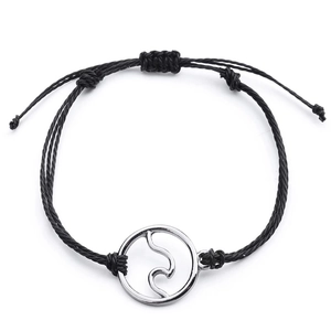 Handmade black wax string bracelet featuring a silver wave charm with adjustable slider