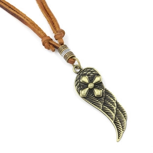 Detail of vintage bronze feather pendant with cross on adjustable brown leather cord