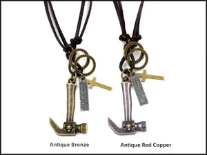 Detail of punk leather necklace with vintage alloy hammer, cross, and skull charms