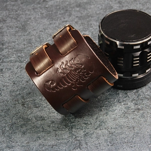 Vintage brown leather scorpion embossed cuff bracelet with adjustable double buckle straps