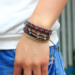 Handmade multilayer leather cross bracelet featuring wooden beads and punk style braiding