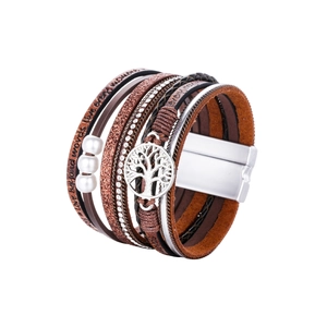 Close-up of bohemian leather wrap bracelet featuring a silver tree of life charm and pearls