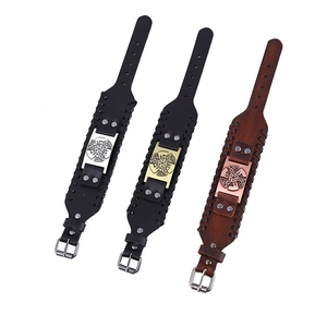 Nordic Viking leather bracelets with radial sun wheel metal charms in black and brown