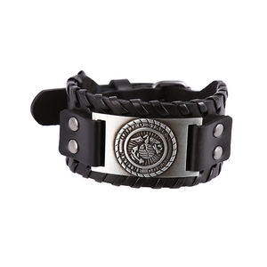 Adjustable wide leather bracelet featuring a metal United States Marine Corps emblem