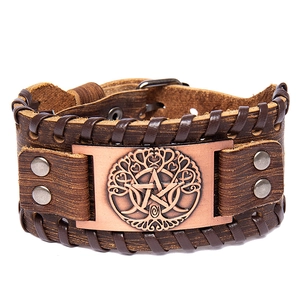 Bracelet vintage en cuir marron avec un médaillon en métal bronze arbre de vie