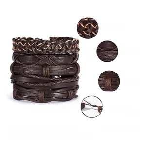 Detailed view of multilayer braided leather bracelet set with metallic alloy buckles