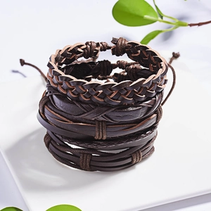 Set of dark brown multilayer leather braided bracelets with vintage woven details