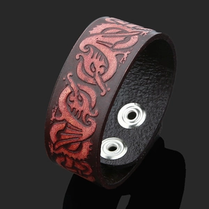 Vintage punk leather bracelet for men with embossed red dragon pattern and snap closure