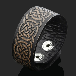 Handmade vintage Viking leather bracelet with embossed bronze Celtic knot and silver snaps