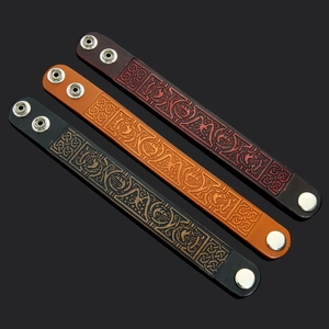 Three-piece set of handmade vintage Viking leather bracelets with Nordic embossed patterns