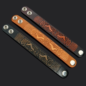 Handcrafted vintage Viking leather bracelet with embossed Celtic deer and metal snaps