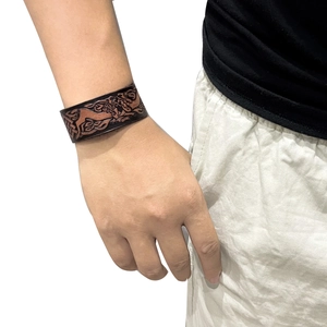 Punk vintage brown leather wide bracelet featuring Celtic Nordic mythical beast embossing