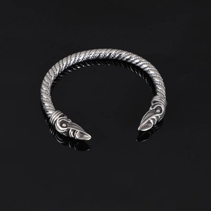 Vintage Viking crow head torque bangle in silver stainless steel with braided rope design
