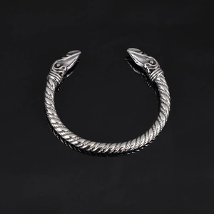 Vintage Nordic Viking stainless steel twisted cable bangle with engraved bird head design