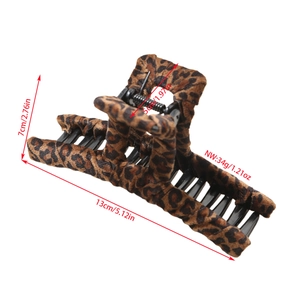Detailed view of leopard print hair claw clip showing 13cm length and 7cm height dimensions