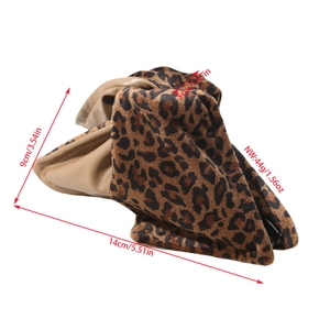 Leopard print velvet hair clip with dimensions 14cm by 9cm on a clean white background