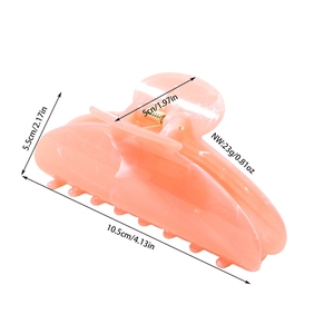 Pink marble hair claw clip for thick hair with dimensions 4.13 inch length and 23g weight