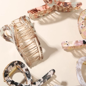 Chic acetate hair claw clips with marble and amber patterns for stylish hair styling