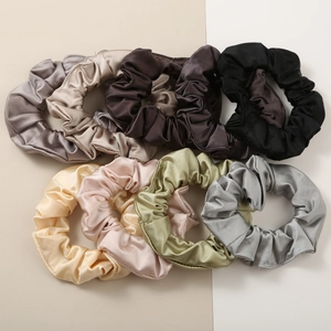 Set of 7 premium silk satin scrunchies in elegant neutral colors for daily hair styling