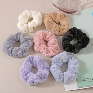 7-piece plush faux rabbit fur scrunchies set in assorted soft colors for women