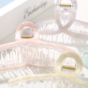 Elegant large pearlescent acetate shark hair clips in various pastel colors for women