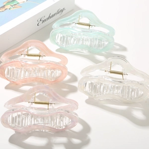 Set of four jelly wave hair claws in pastel colors with high-quality metal springs
