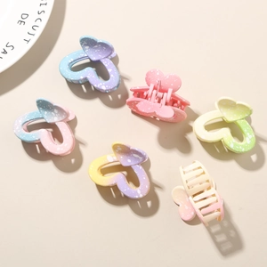 Mini heart-shaped gradient hair clips with macaron colors and spotted texture details