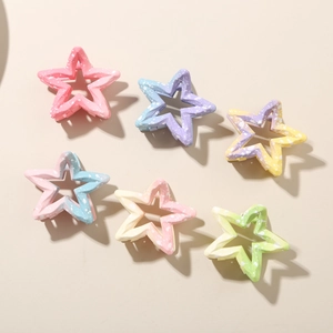 Detailed set of six gradient star hair claws with hollow design and floral spray finish